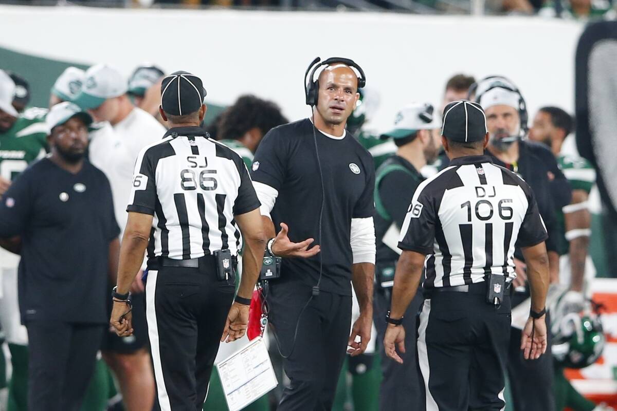 New York Jets head coach Robert Saleh talks with officials during the second half of an NFL pre ...