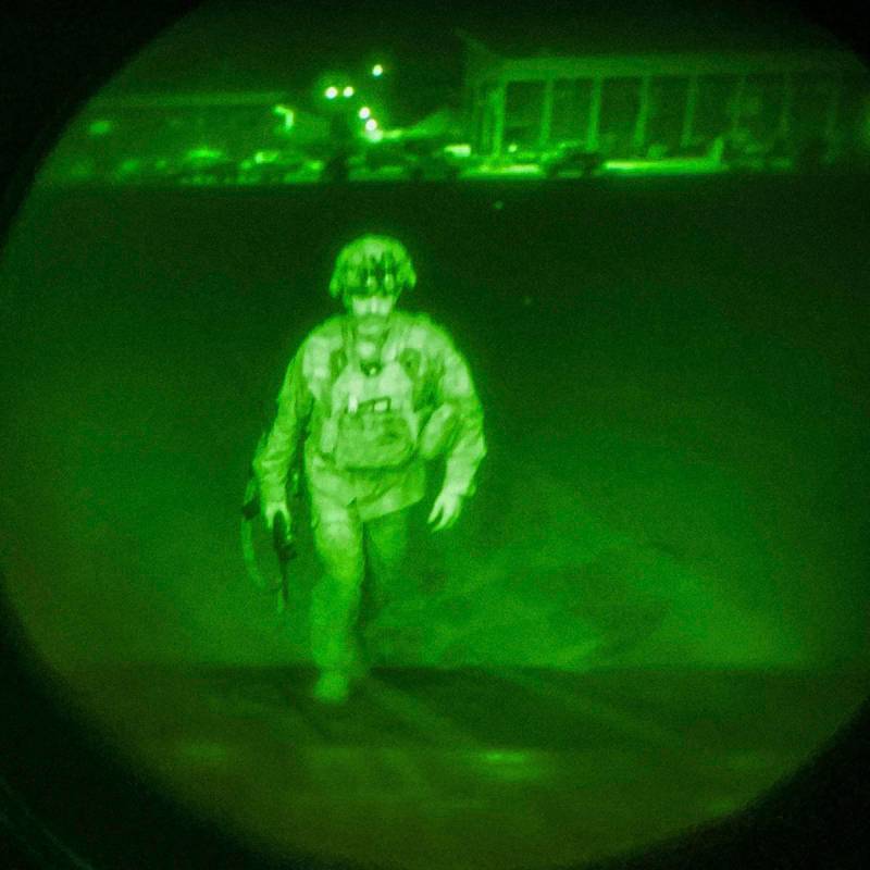 In this image made through a night vision scope and provided by the U.S. Army, Maj. Gen. Chris ...