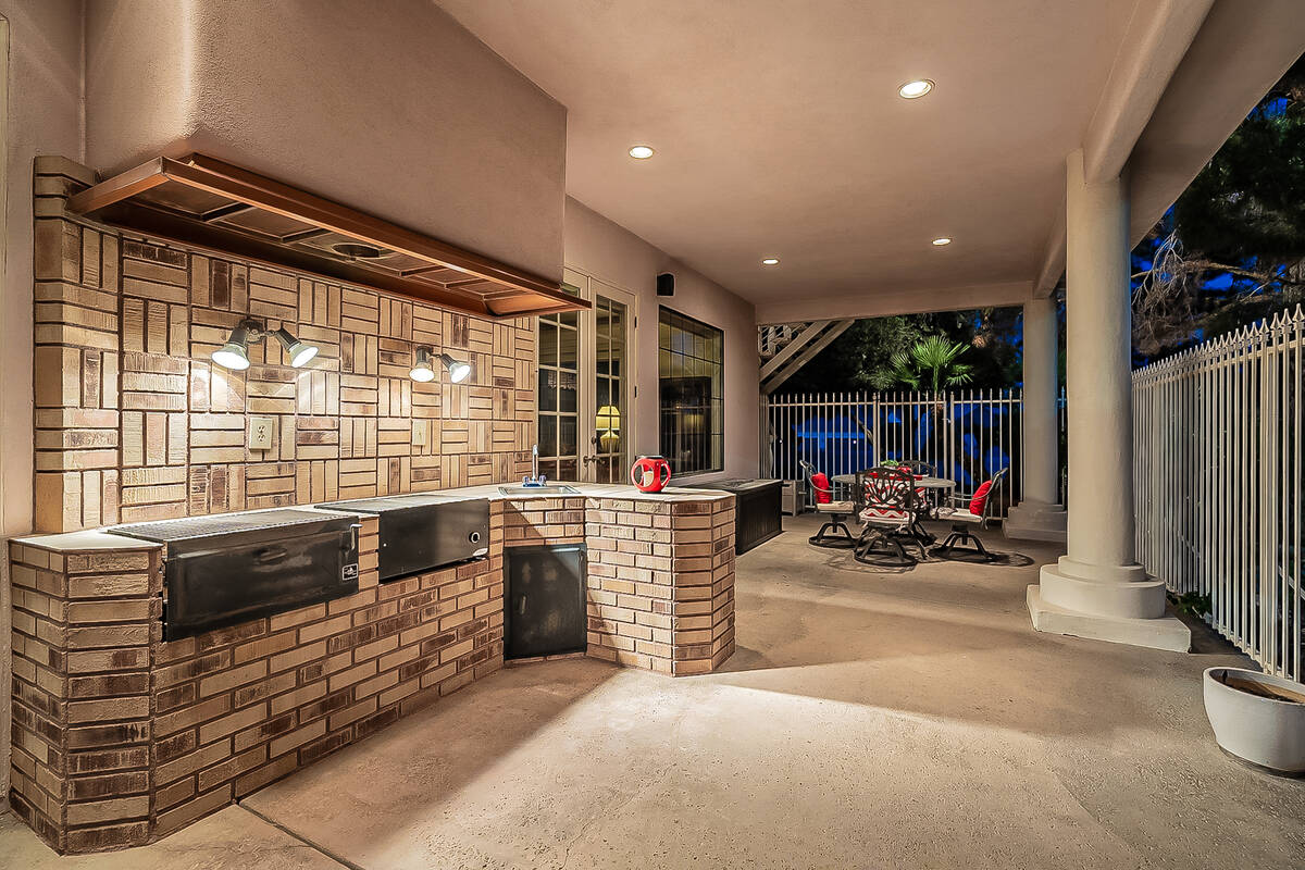 The home has an outdoor kitchen. (BHHS)
