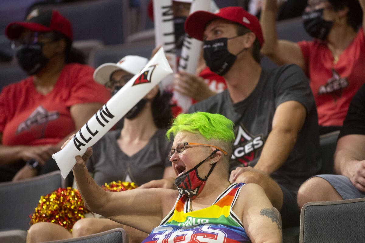 Las Vegas Aces cheer on their team during the first half of a WNBA game against the Chicago Sky ...