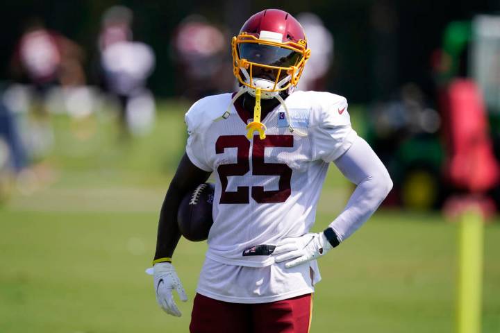 Peyton Barber (25) stands during practice at the Washington Football Team's NFL football traini ...