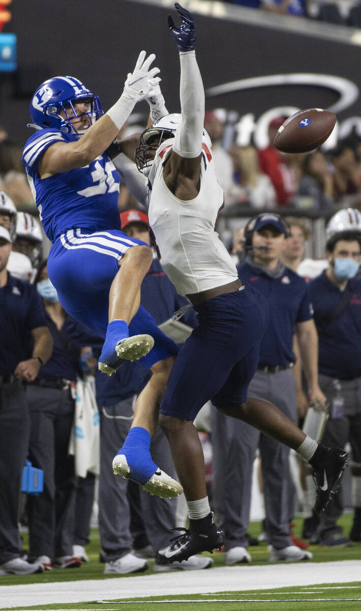 Brigham Young Cougars tight end Dallin Holker (32) has his pass broken up by Arizona Wildcats c ...