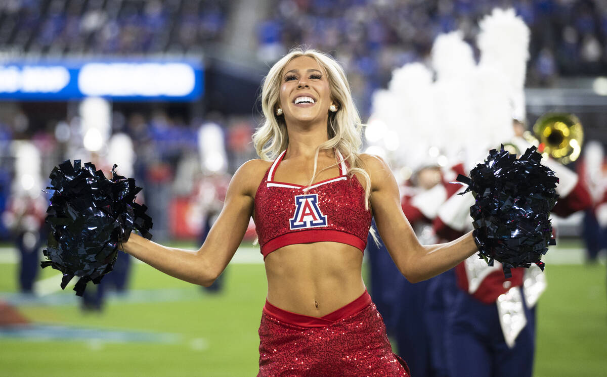 Arizona Wildcat cheerleaders perform in the first quarter during a college football game agains ...