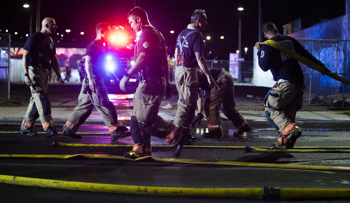 The Las Vegas Fire Department responds to the aftermath of a fire at 1026 S. Main Street on Sun ...