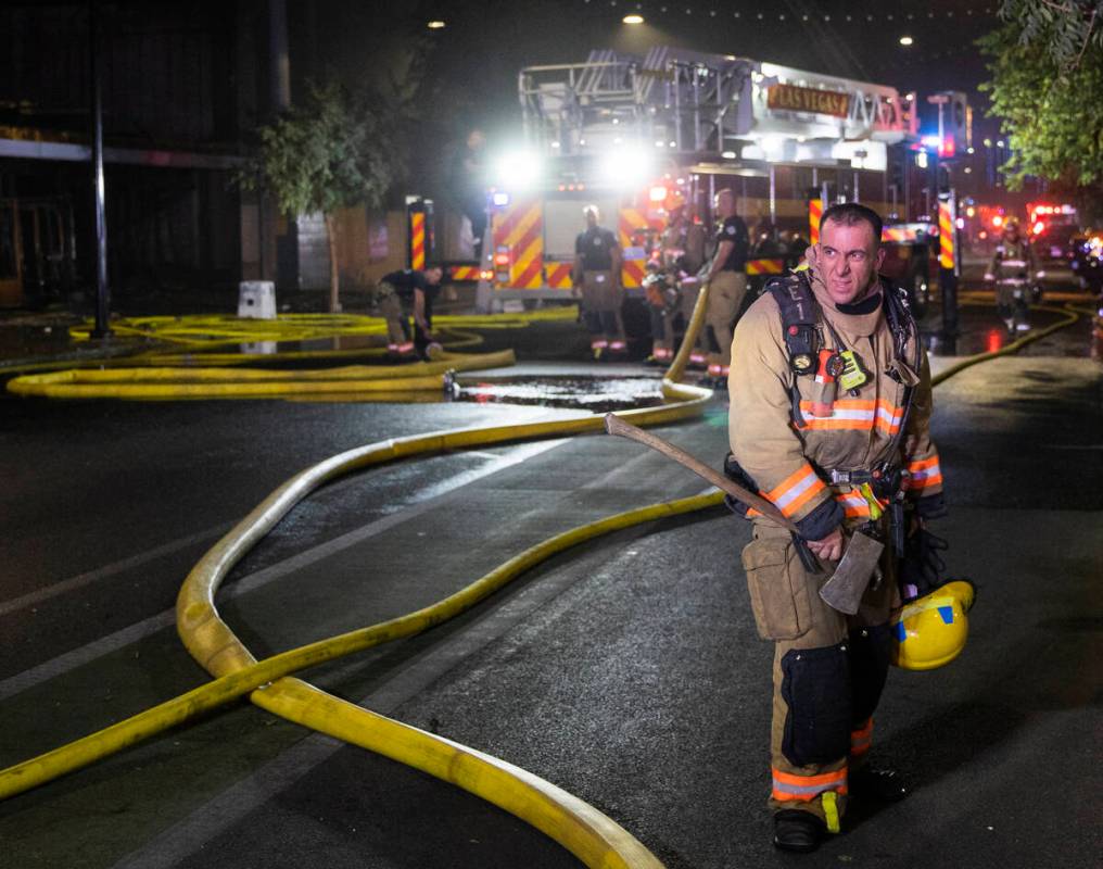 The Las Vegas Fire Department responds to the aftermath of a fire at 1026 S. Main Street on Sun ...