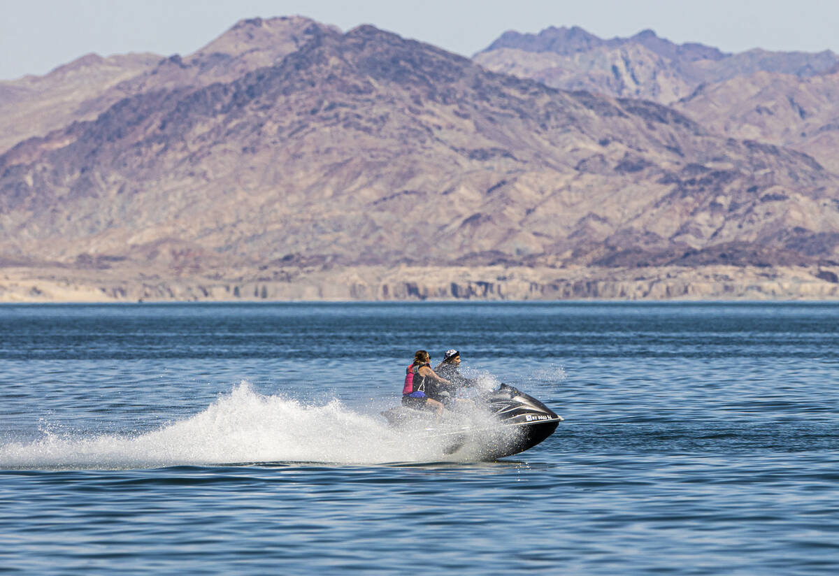 People jet ski at Lake Mead on Labor Day on Monday, Sept. 6, 2021, nere Boulder City. (Benjamin ...