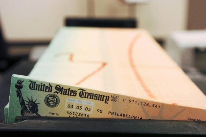 Trays of printed social security checks wait to be mailed from the U.S. Treasury's Financial Ma ...