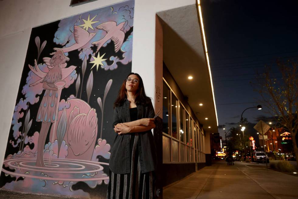 Kim Sol with her mural "Starlights & Rivulets" for the Life is Beautiful music, art and food fe ...