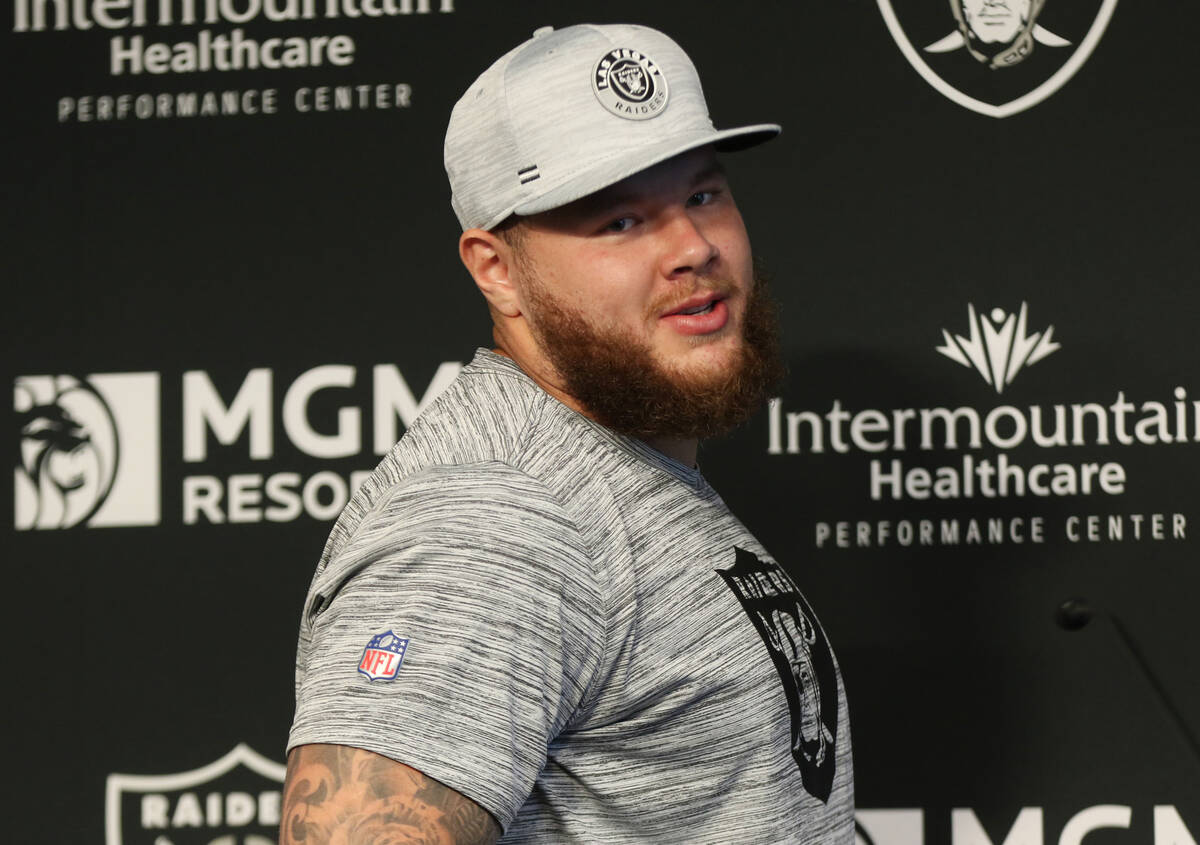 Raiders center Andre James arrives at a news conference at the Raiders Headquarters at the Inte ...