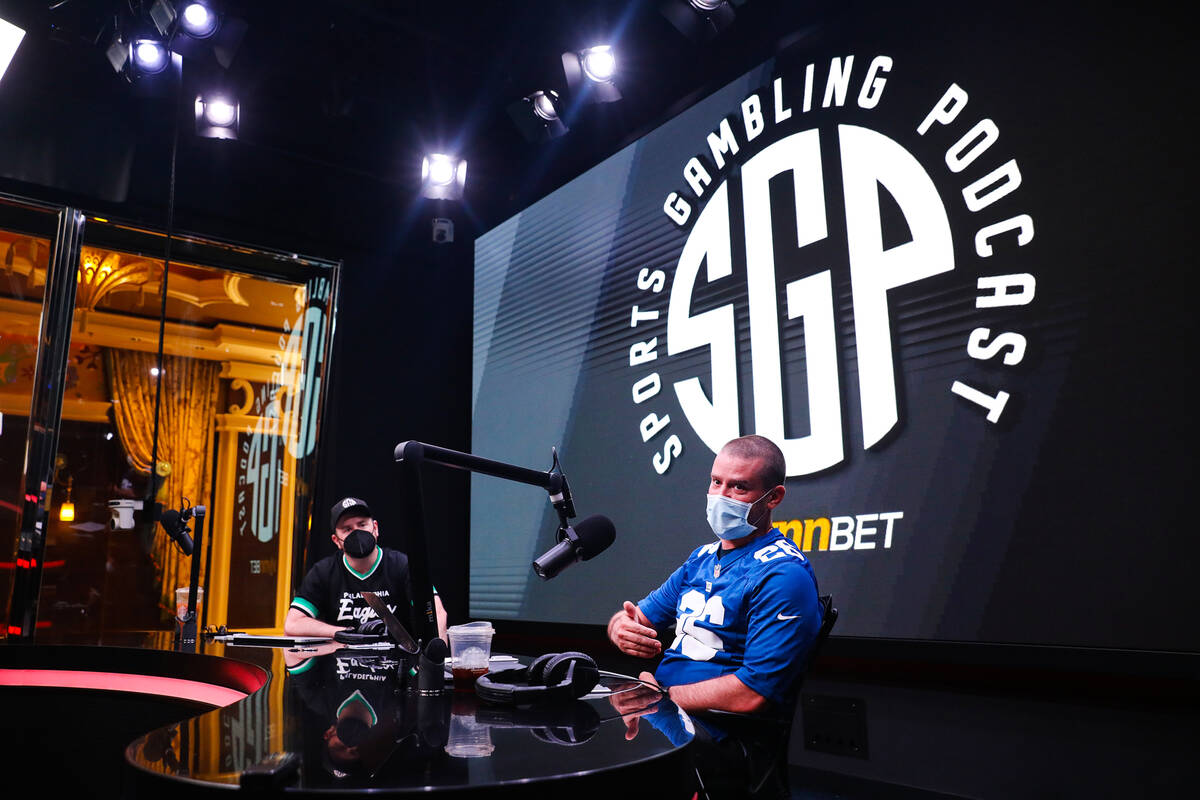 Sean Green, left, and Ryan Kramer, right, hosts of the Sports Gambling Podcast, speak to the Re ...