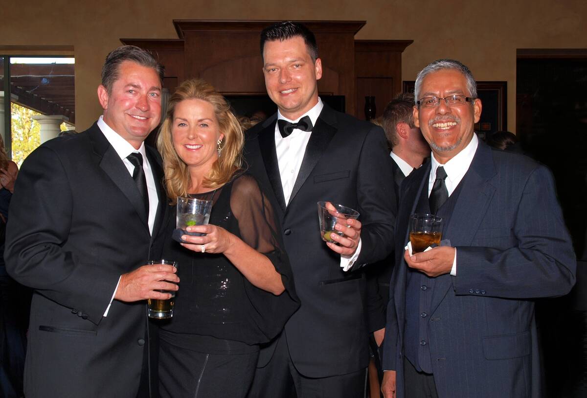 From left, Scott and Jill Gragson, Robert Torres Jr., and Robert Torres Sr. (Las Vegas Review-J ...
