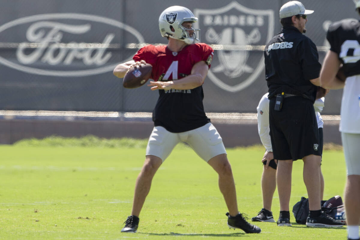 Raiders quarterback Derek Carr (4) prepares to throw during team practice at the Raiders Headqu ...