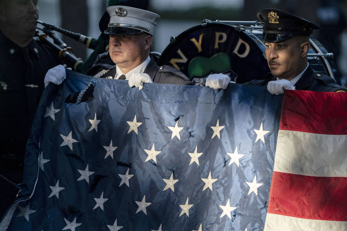 Flag bearers rehearse before ceremonies to commemorate the 20th anniversary of the Sept. 11 ter ...