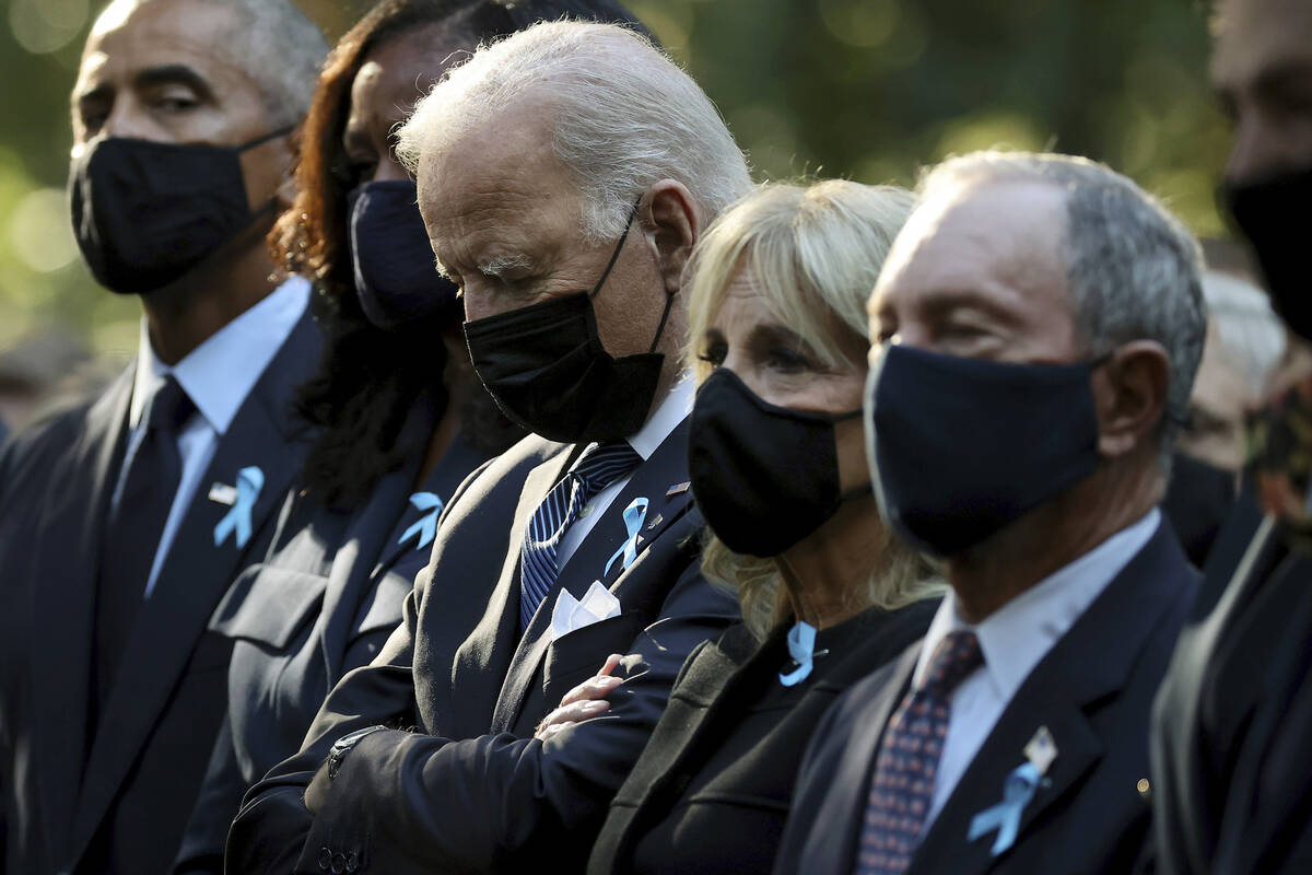 From left, former President Barack Obama, Michelle Obama, President Joe Biden, first lady Jill ...