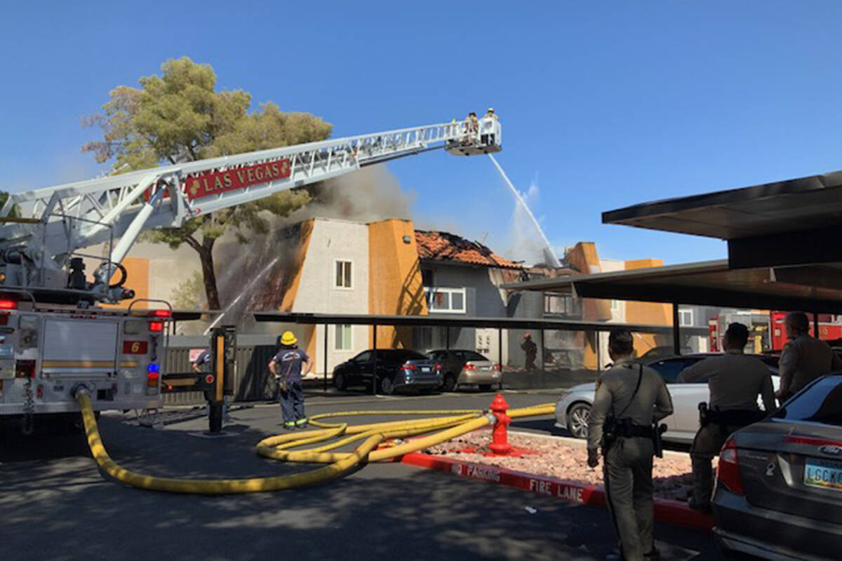 Crews battle a fire Saturday, Sept. 11, 2021, at Sundance Village Apartments on the 6500 block ...