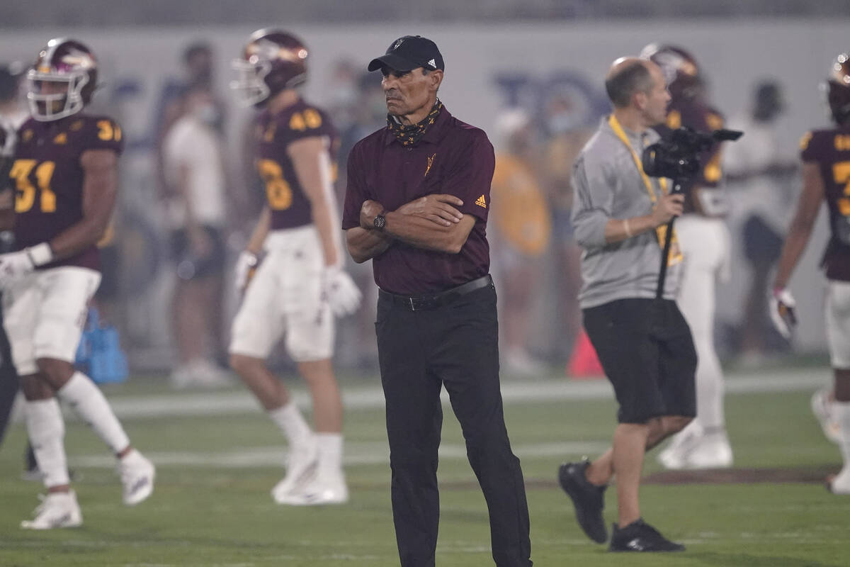Arizona State head coach Herm Edwards watches warm ups prior to an NCAA college football game a ...
