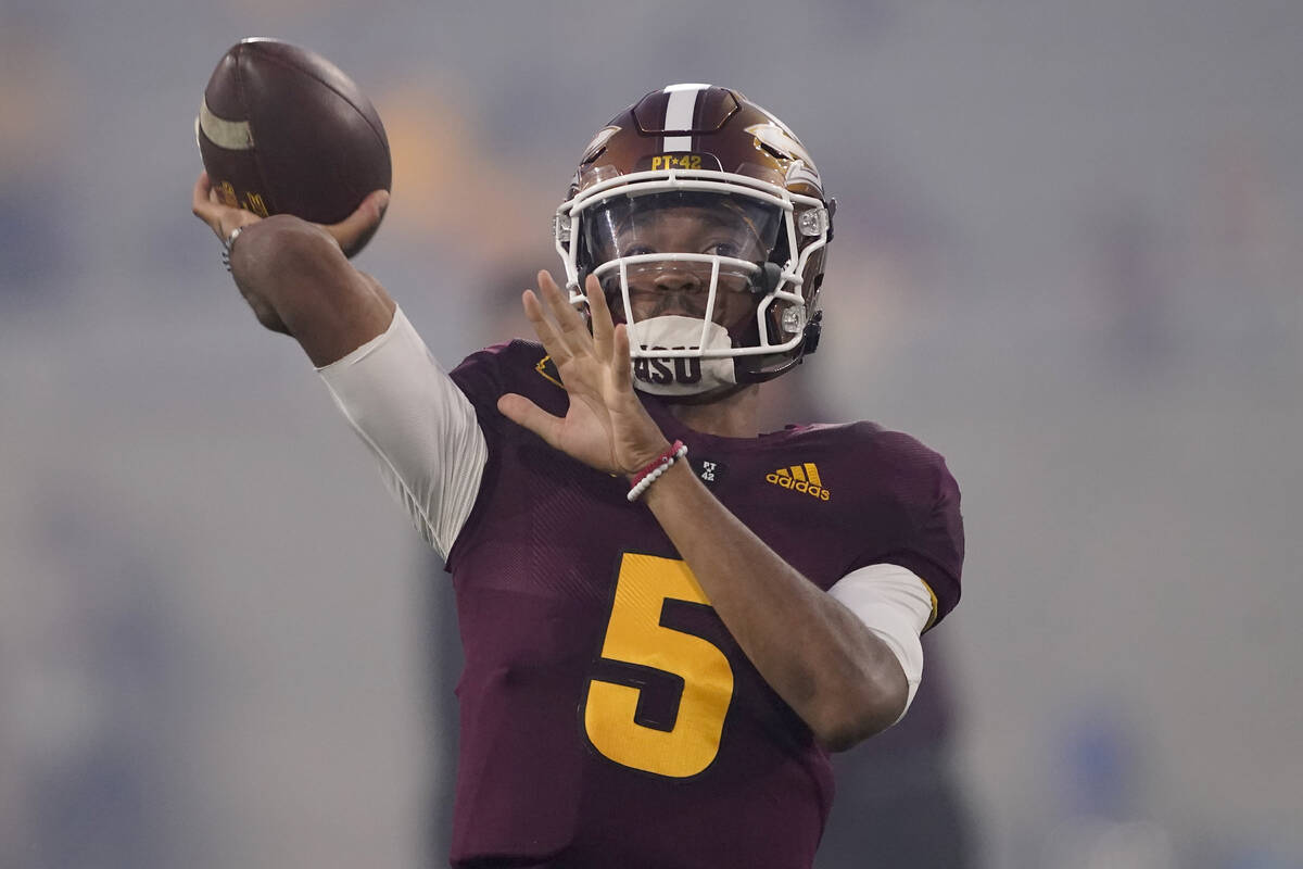 Arizona State quarterback Jayden Daniels (5) warms up prior to an NCAA college football game ag ...