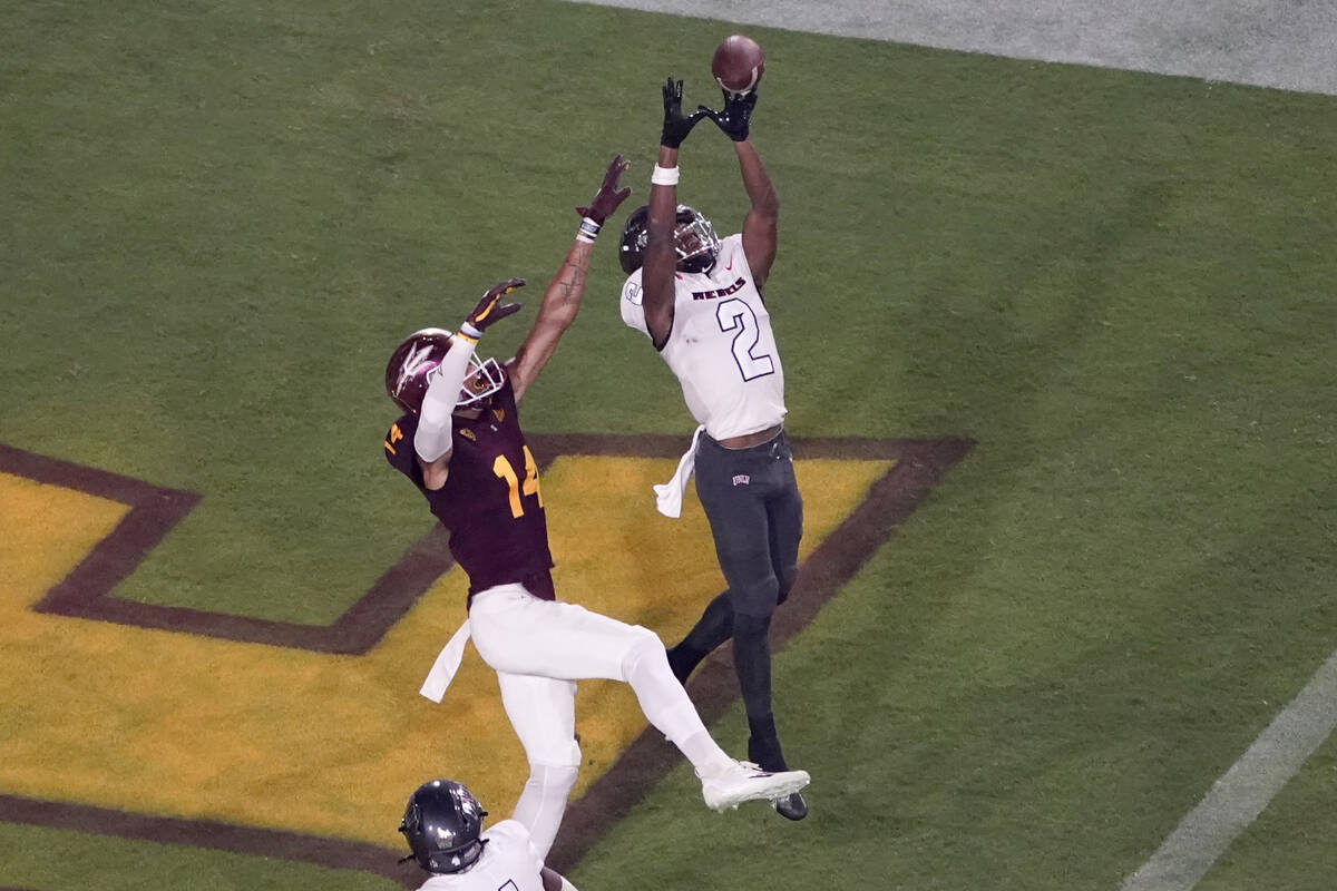 UNLV defensive back Nohl Williams (2) intercepts a pass in the end zone intended for Arizona St ...