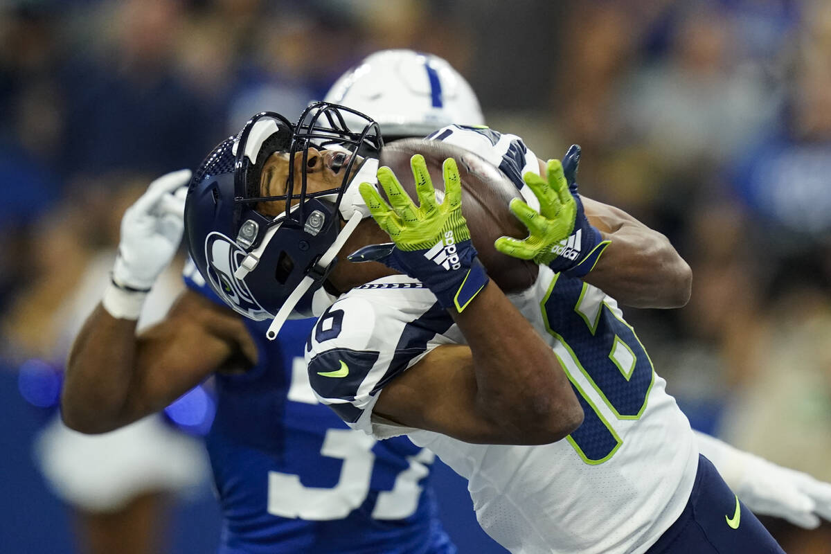 Seattle Seahawks wide receiver Tyler Lockett (16) makes catch for a touchdown in front of India ...