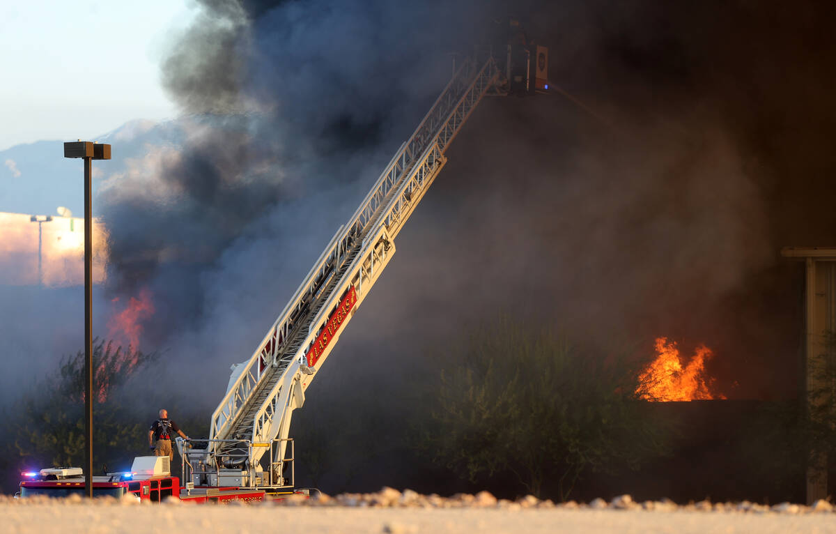 The North Las Vegas Fire Department battles a fire at a Republic Services recycling facility Mo ...