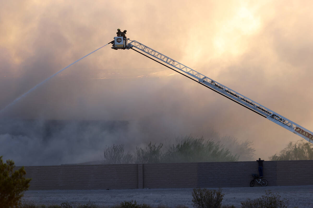 The North Las Vegas Fire Department battles a fire at a Republic Services recycling facility Mo ...