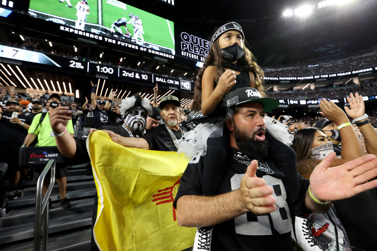 Fans, including Jocelyn Lopeman, 6, and her father Ryan Lopeman of Fontana, Calif., cheer as th ...