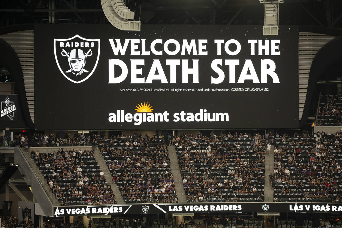 Fans fill the stands during an NFL football game between the Raiders and Baltimore Ravens at Al ...