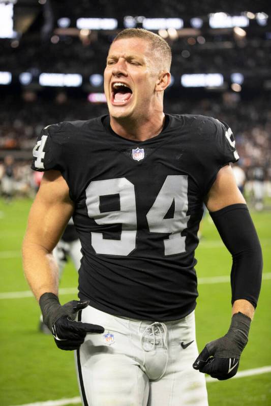 Raiders defensive end Carl Nassib (94) celebrates after beating the Baltimore Ravens in overtim ...