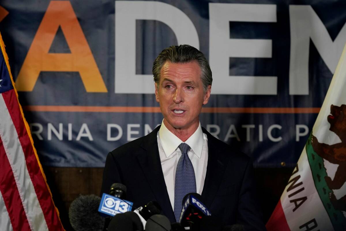 California Gov. Gavin Newsom addresses reporters after beating back the recall attempt that aim ...