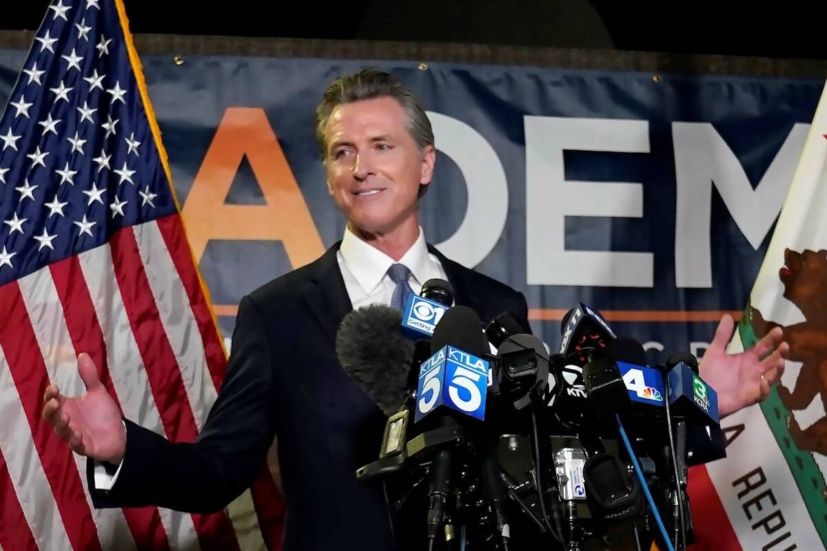 California Gov. Gavin Newsom addresses reporters after beating back the recall attempt that aim ...