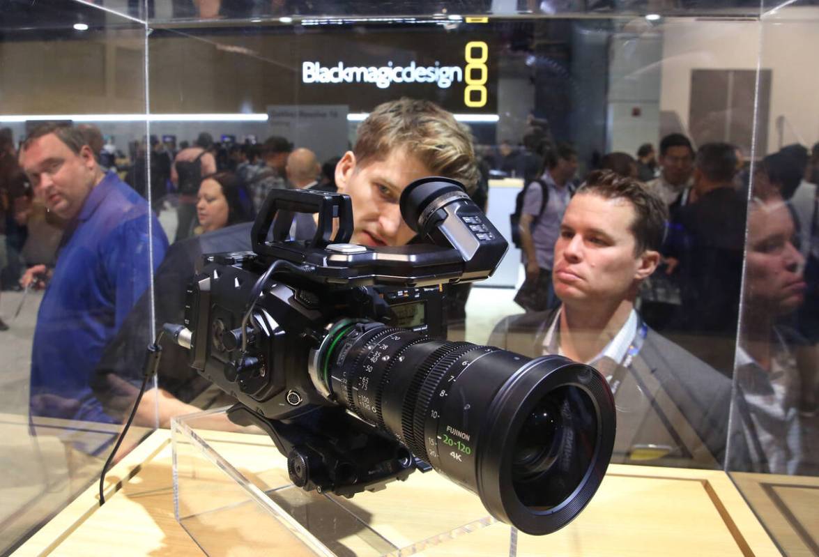 Tim Garrow, center, and Richard Griffin checkout Blackmagic URSA mini Pro 4.6K G2 film camera d ...