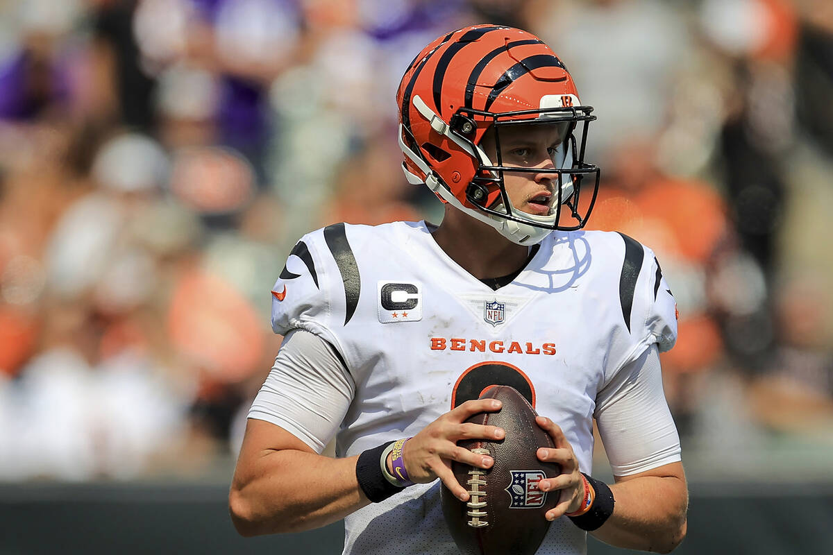 Cincinnati Bengals quarterback Joe Burrow (9) drops back to pass against the Minnesota Vikings ...