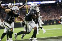 Raiders wide receiver Bryan Edwards (89) reacts after making a catch short of a touchdown, with ...