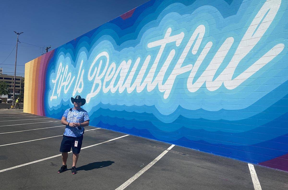 Craig Nyman poses in front of the just-finished Life Is Beautiful mural in downtown Las Vegas o ...