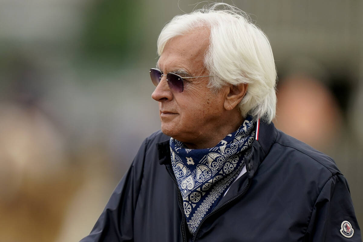 FILE - In this April 28, 2021, file photo, horse trainer Bob Baffert watches workouts at Church ...