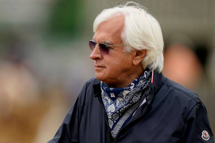 FILE - In this April 28, 2021, file photo, horse trainer Bob Baffert watches workouts at Church ...