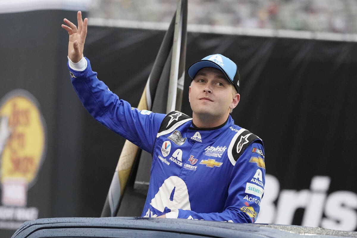 William Byron waves to fans before a NASCAR Cup Series auto race at Bristol Motor Speedway Satu ...
