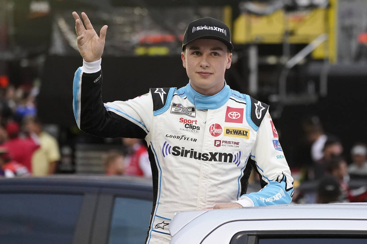 Christopher Bell waves to fans before a NASCAR Cup Series auto race at Bristol Motor Speedway S ...