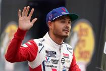 Kyle Larson waves to fans before a NASCAR Cup Series auto race at Bristol Motor Speedway Saturd ...