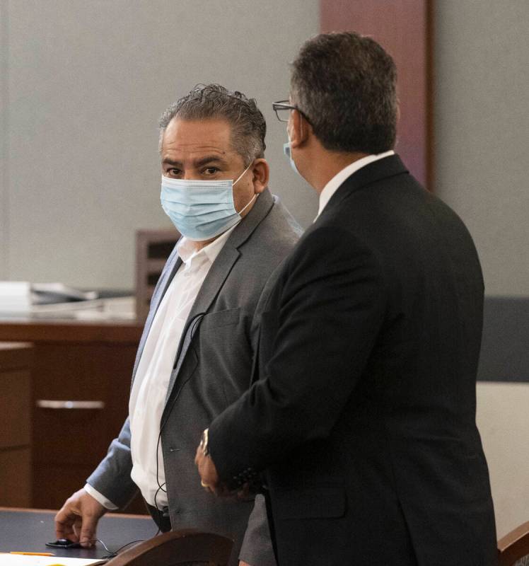 Omar Rueda-Denvers, left, and his attorney Christopher Oram appear in court during Denvers&#x20 ...