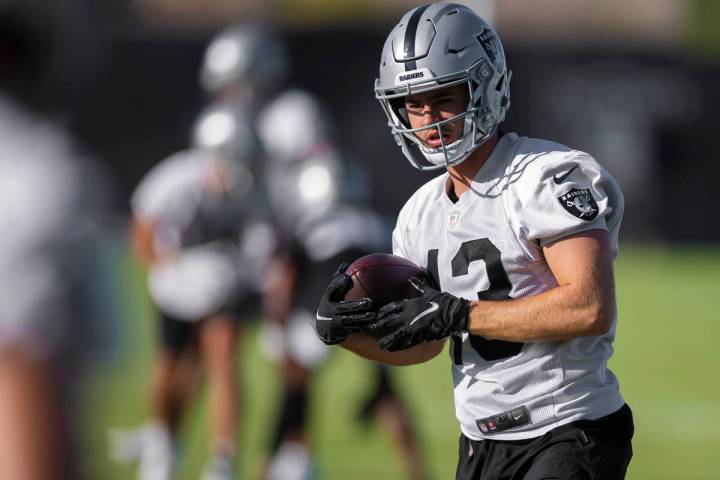 Raiders wide receiver Hunter Renfrow (13) makes a catch during drills at training camp on Monda ...