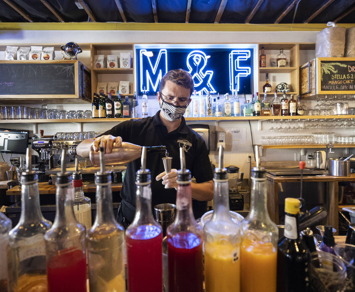 Bar assistant Jeremy Perry makes a “Baby Driver” at Makers & Finders on Wedne ...