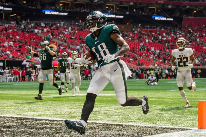 Philadelphia Eagles wide receiver Jalen Reagor (18) scores a touchdown during the second half o ...