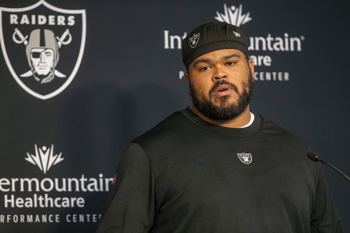 Raiders offensive tackle Jermaine Eluemunor takes questions from the media during a news confer ...