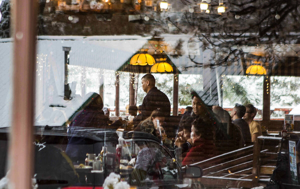Restaurant-goers enjoy food inside Mount Charleston Lodge on Tuesday, May 1, 2018. (Review-Jour ...