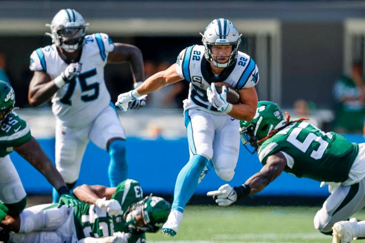 Carolina Panthers running back Christian McCaffrey (22) runs the football against the New York ...