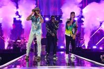 Nelly (C) performs with (L-R) Brian Kelley and Tyler Hubbard of Florida Georgia Line onstage du ...