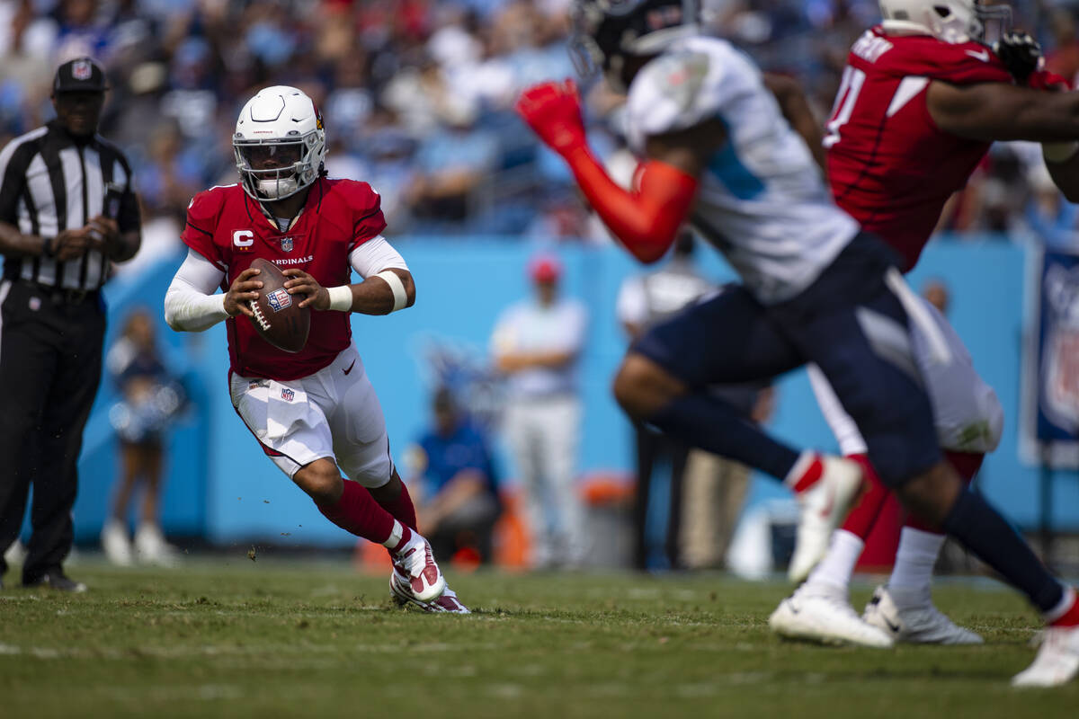 Arizona Cardinals quarterback Kyler Murray (1) runs with the ball against the Tennessee Titans ...