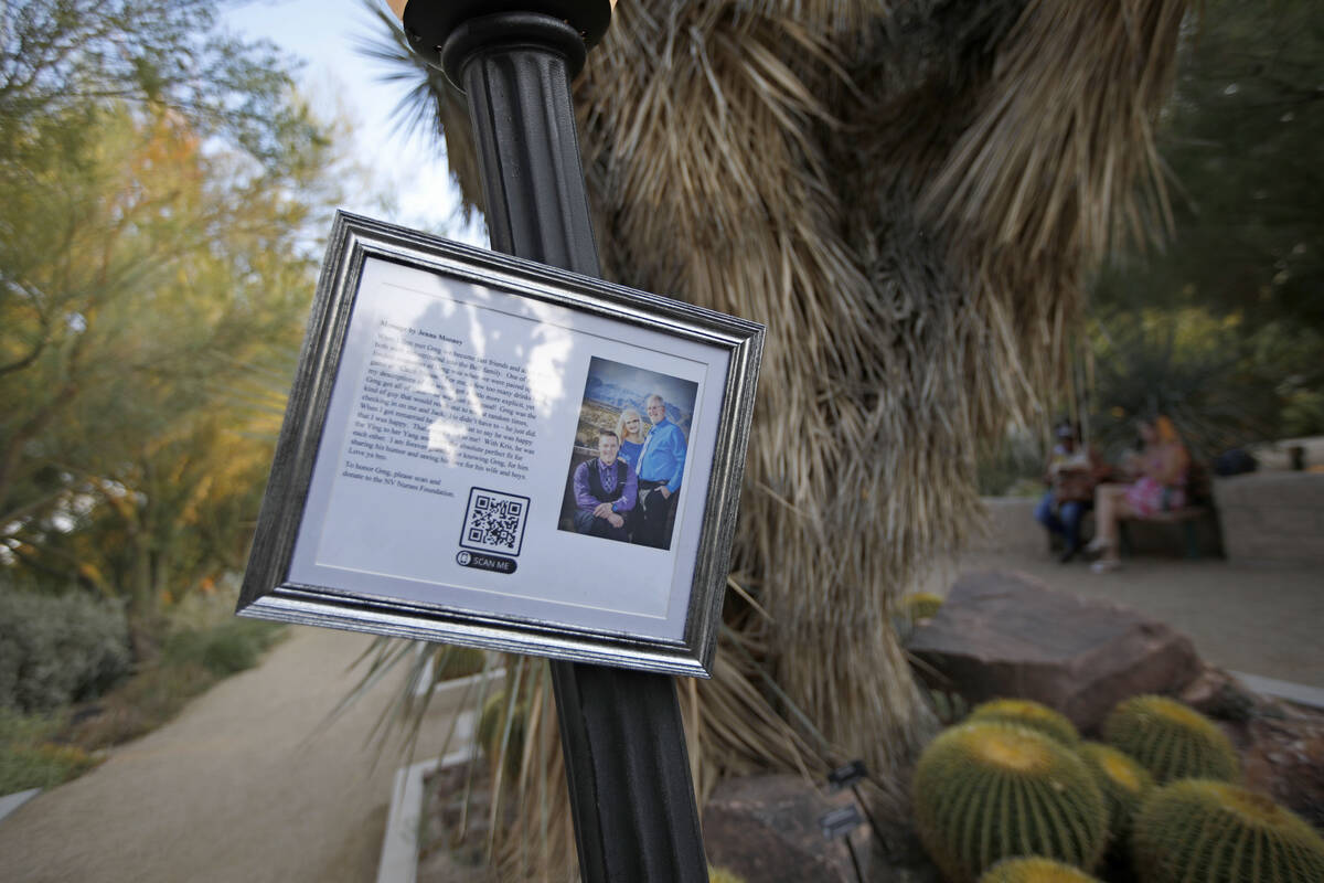 Greg Peistrup’s photo is seen in the Botanical Garden during a celebration of life marki ...