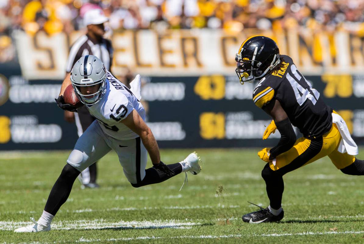 Raiders wide receiver Hunter Renfrow (13) breaks up field past Pittsburgh Steelers cornerback J ...